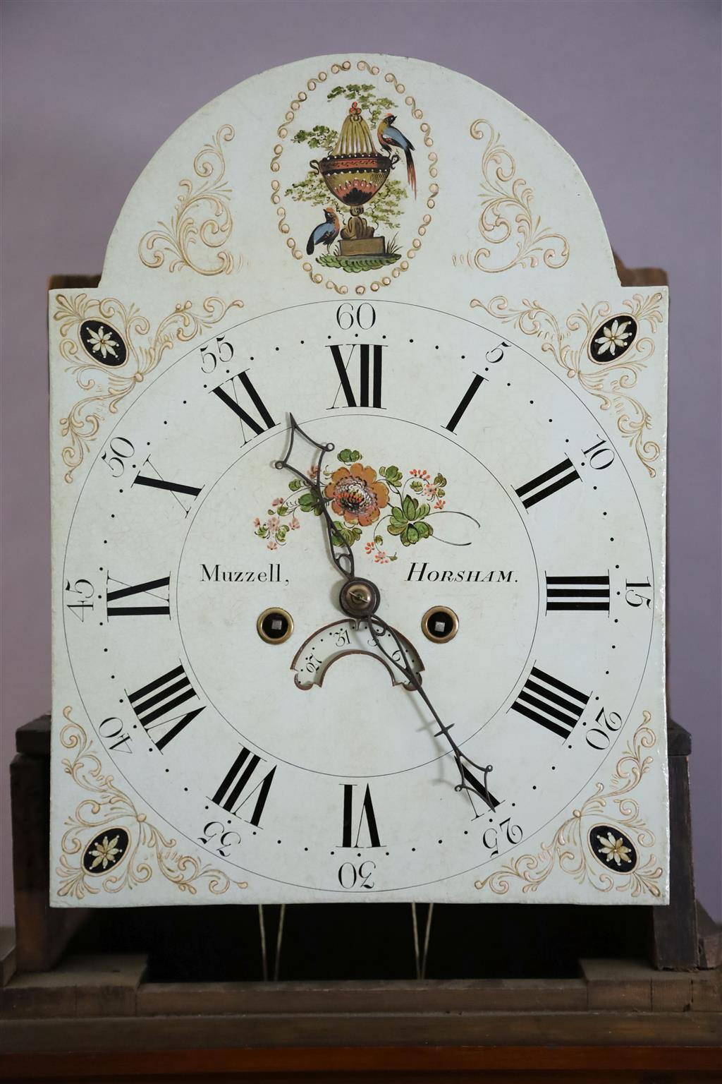 Muzzell of Horsham. An early 19th century mahogany eight day longcase clock, H.7ft 5in.